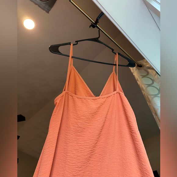 Mid calf dress in a beautiful pale orange color. adjustable scrunch on chest - Picture 3 of 4
